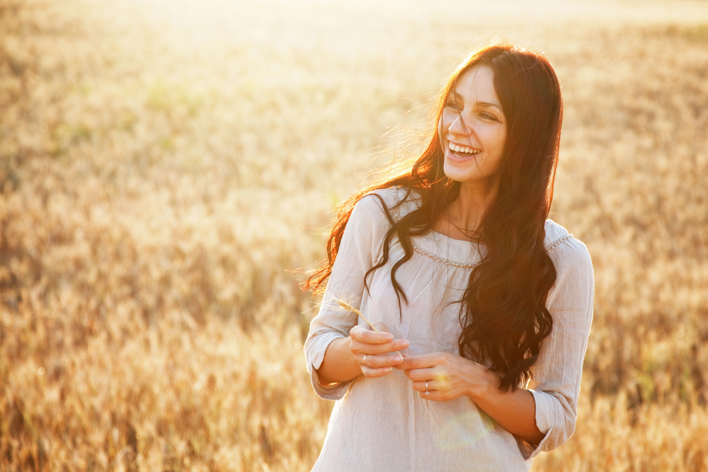 Beautiful lady in wheat field