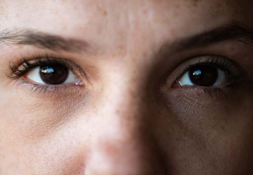 Close up of woman's eyes while she uses Eye Movement Desensitization and Reprocessing