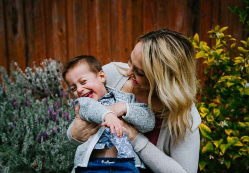 Mother and young child work with therapist with Parent-Child Interaction Therapy