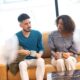 Two adults sitting together, reflecting different ways people experience closeness and connection in relationships.