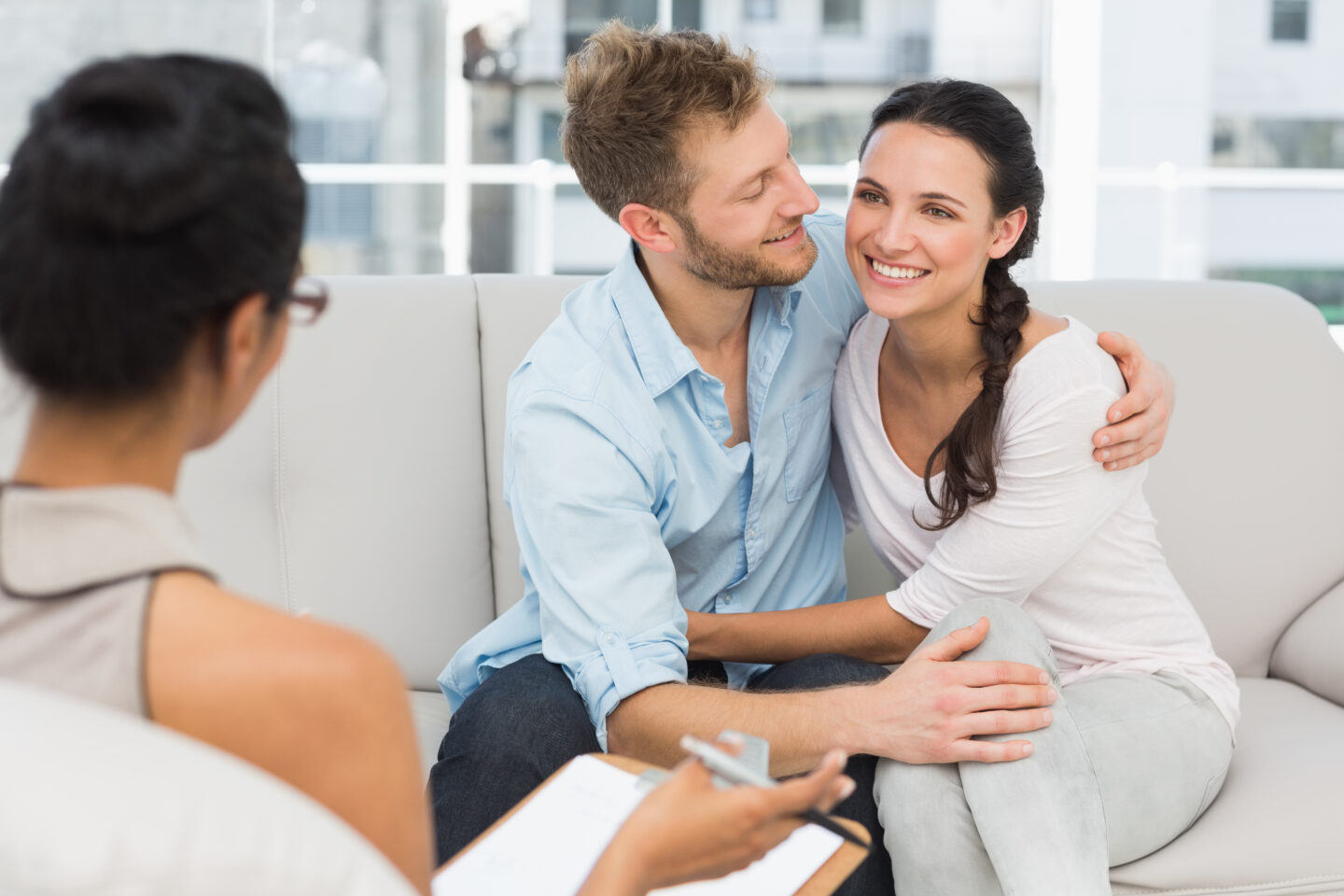 Compassionate New Jersey couples therapist supporting partners during a relationship counseling appointment