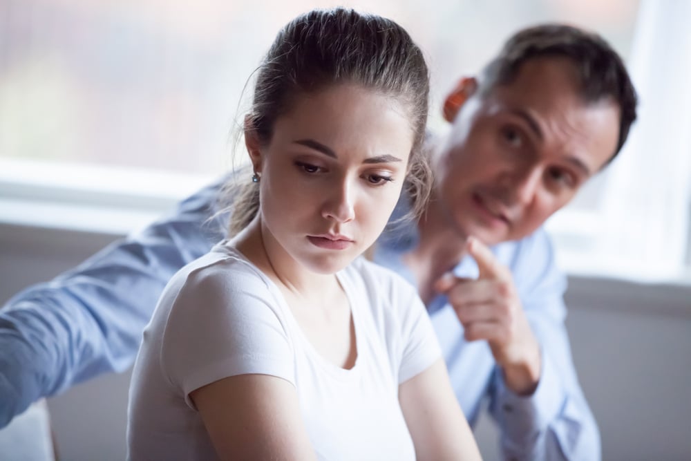 Woman dealing with manipulative behavior from her spouse