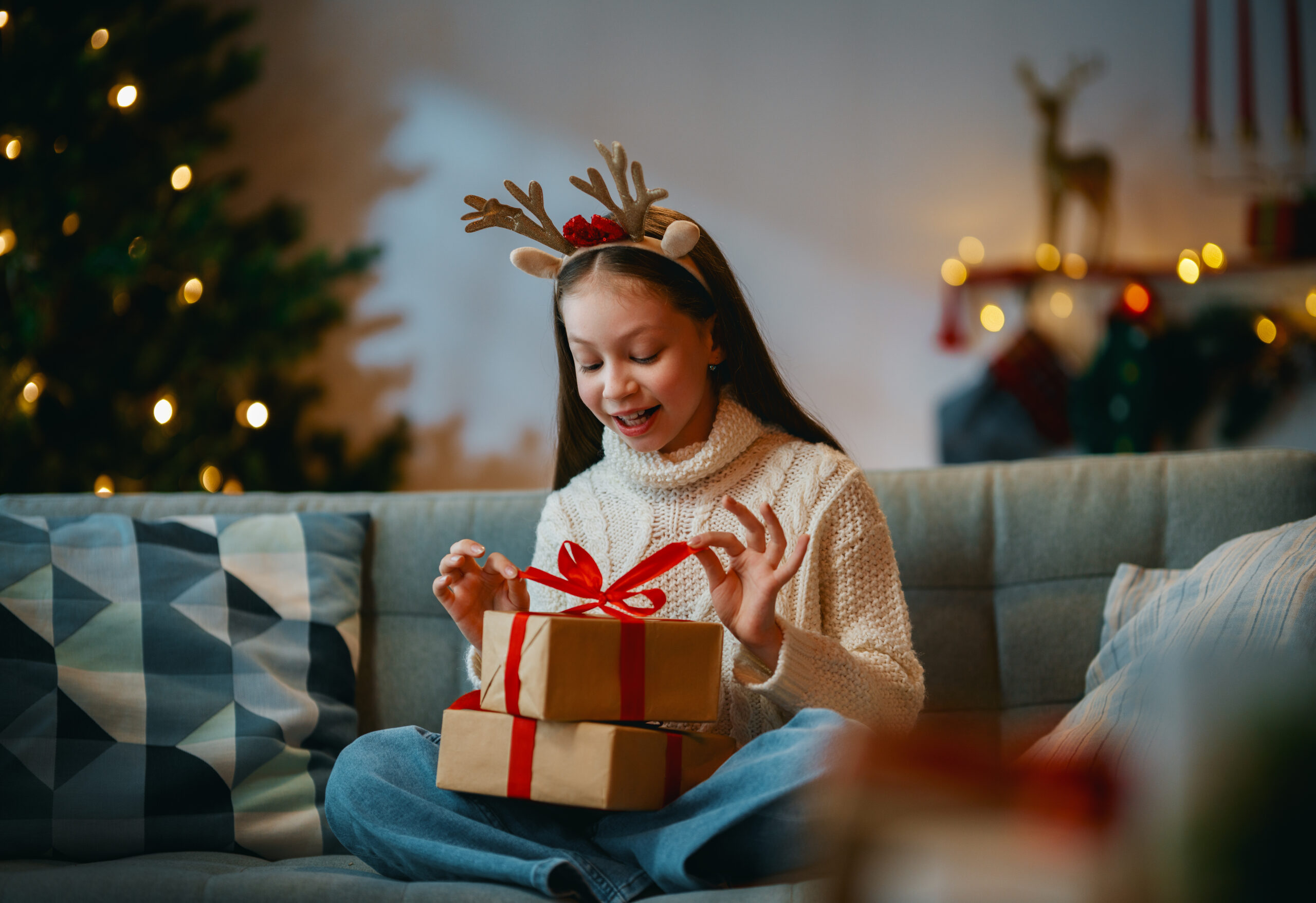 girl with christmas gift 2025 12 05 01 10 25 utc scaled