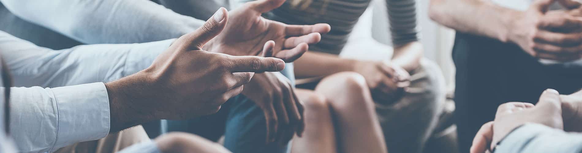 Photo of hands from group therapy session