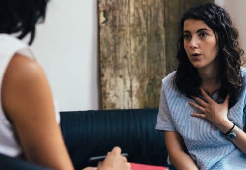 Woman receives individual therapy from mental health therapist.