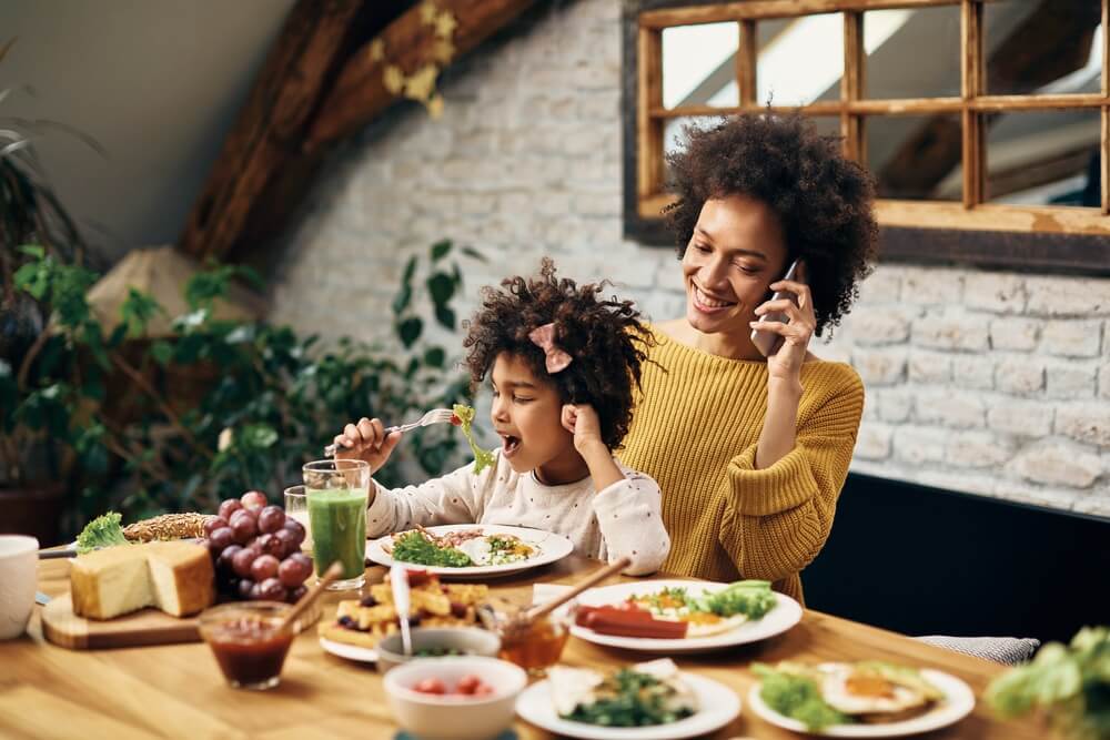 Mom and toddler practice intuitive eating