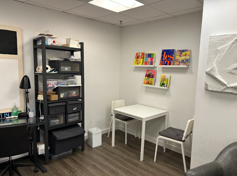 Play therapy room with craft supplies and children's books at the Lukin Center Hoboken office