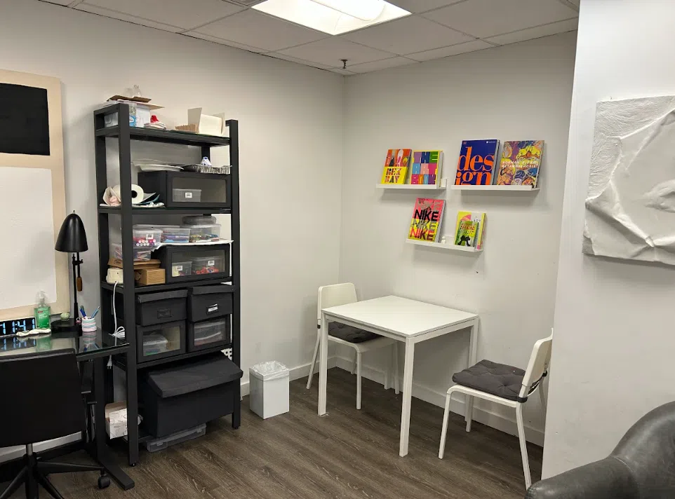 Play therapy room with craft supplies and children's books at the Lukin Center Hoboken office