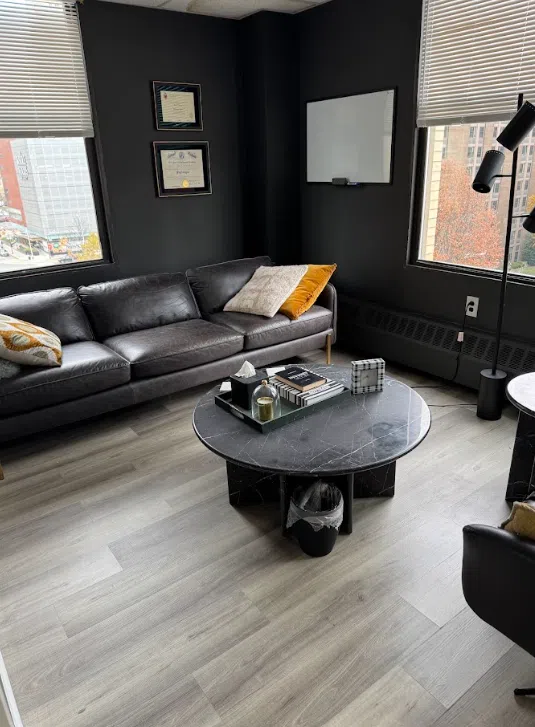 Reception lounge with leather seating at the Lukin Center Jersey City therapy office