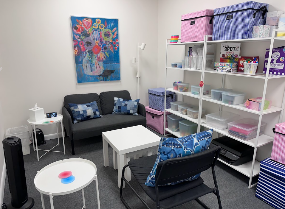 Child and play therapy room with colorful decor and toy storage at the Lukin Center Montclair office