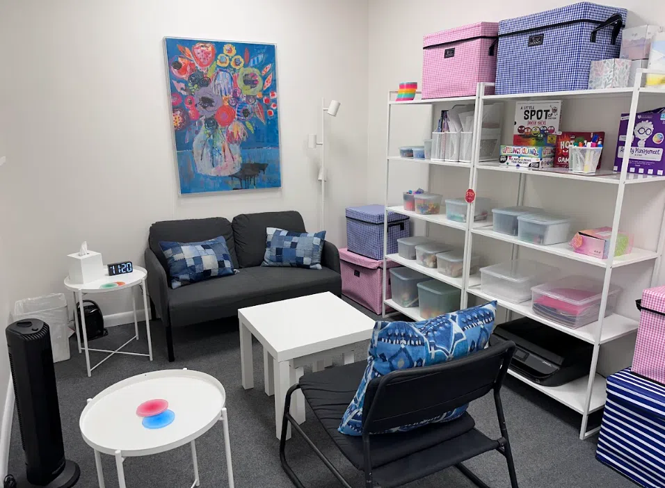 Child and play therapy room with colorful decor and toy storage at the Lukin Center Montclair office