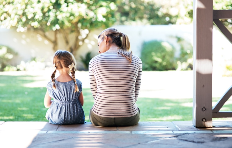 Mom uses positive parenting to speak with young daughter.