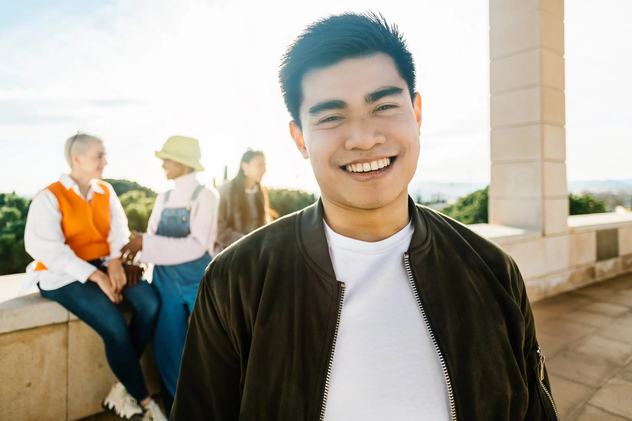 young confident asian man smiling at camera while 2025 03 11 16 08 04 utc scaled